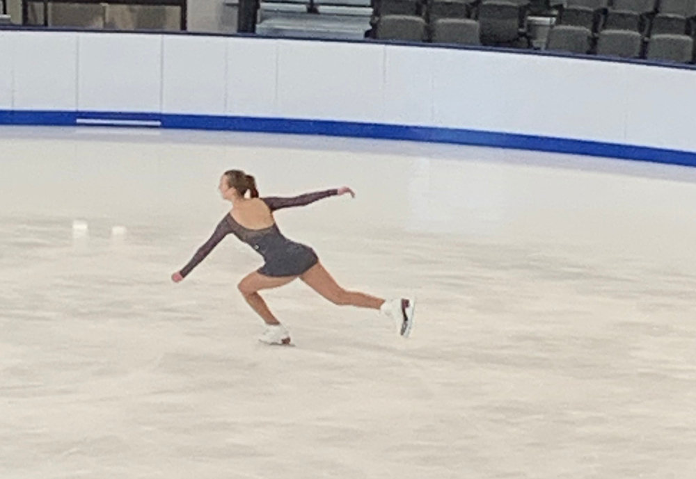 Cali Roloson performing on the ice.